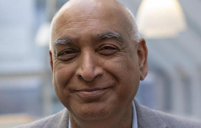 A headshot of professor Shiv Pillai.