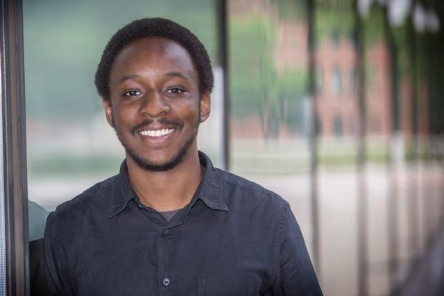 A headshot of professor Demba Ba.