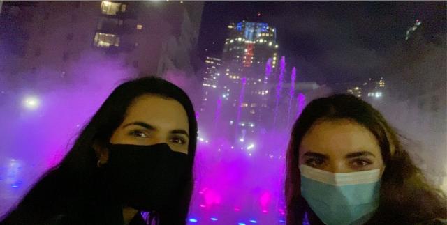 Image of my friend and I at a fountain in Boston