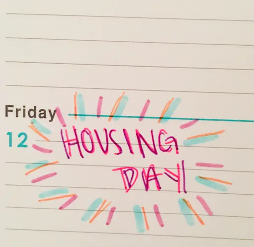 I wrote 'Housing Day' on my agenda's calendar.
