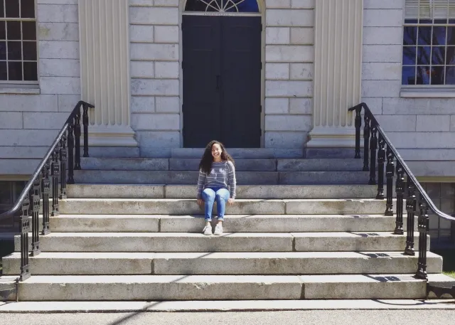 Girl sitting on steps