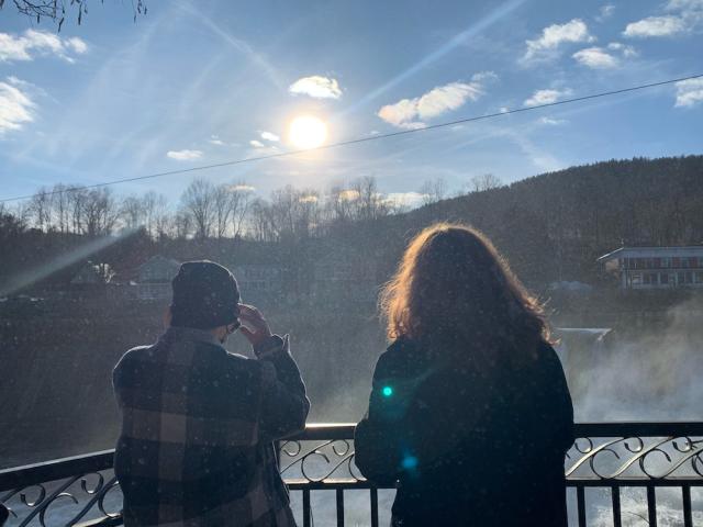 My roommate and I standing in the mist of a waterfall at Shelburne Falls. 