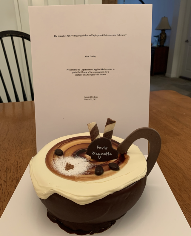 Cake from Paris Baguette in front of  my Thesis Title Page