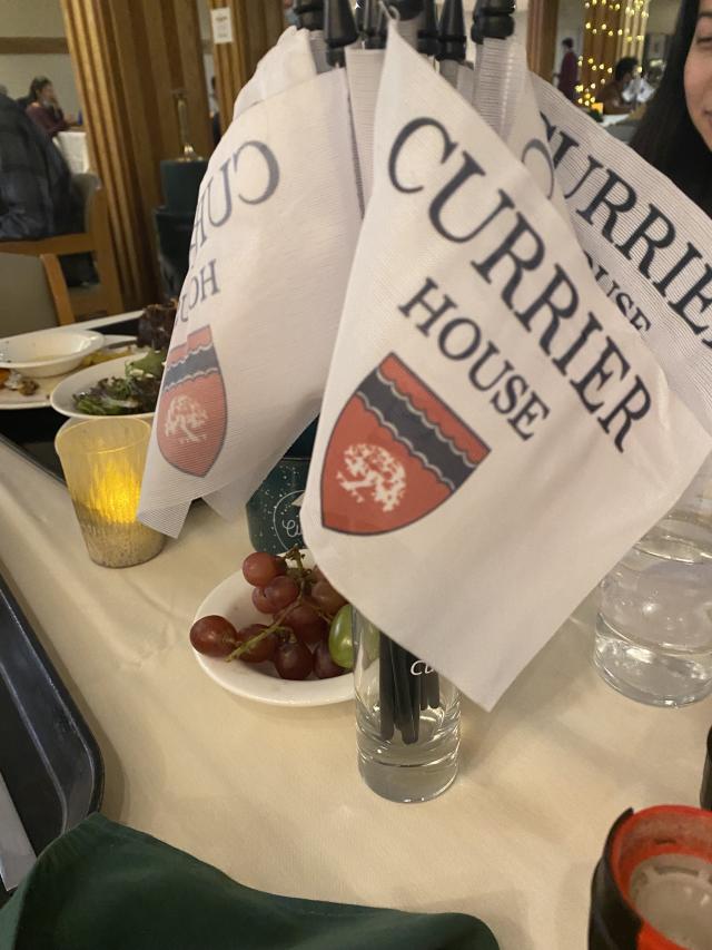 flags with Currier House emblem on them