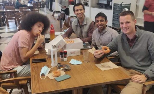 Picture of myself and three friends in Leverett Dining Hall