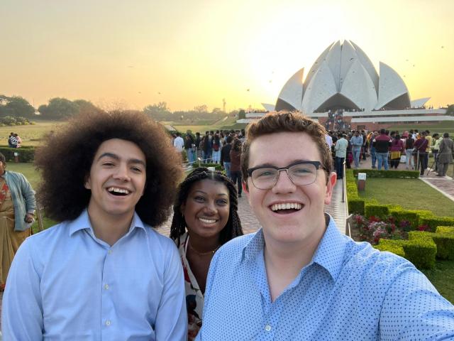 Myself and two friends in front of the Lotus temple on our trip to Delhi