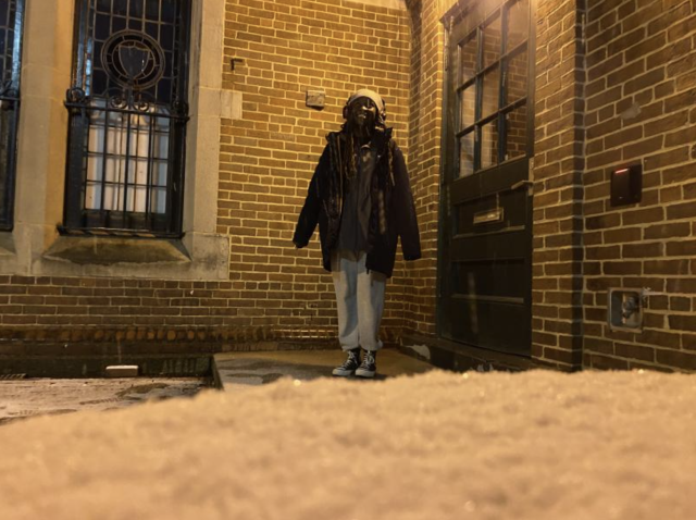 Student standing in snow