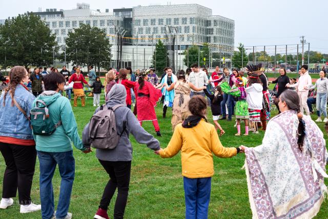 A group friendship dance at the Harvard Powwow. Picture Credits: Cathie Dondero 