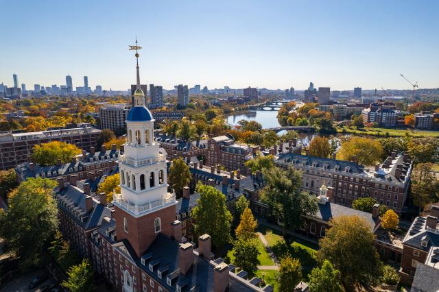 An aerial view of Lowell House tower overlooking the Charles River.