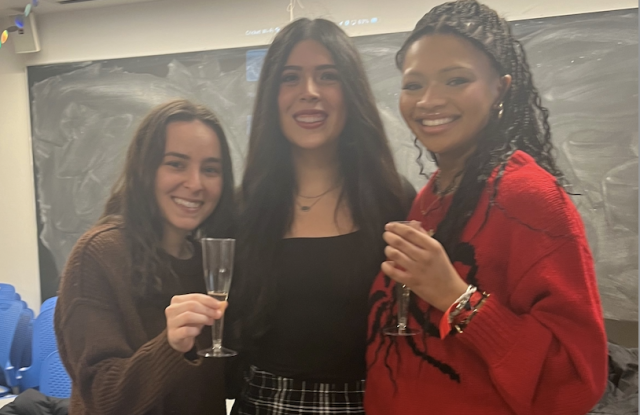 three girls smiling for a picture