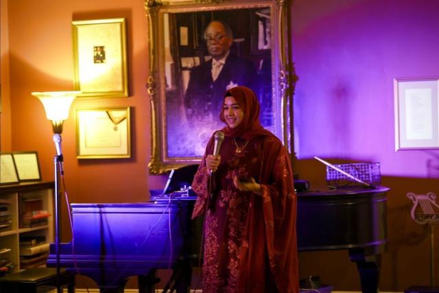 Samia Afrose, President of BASHA speaking about the Flood Relief Fundraiser for Bangladesh.
