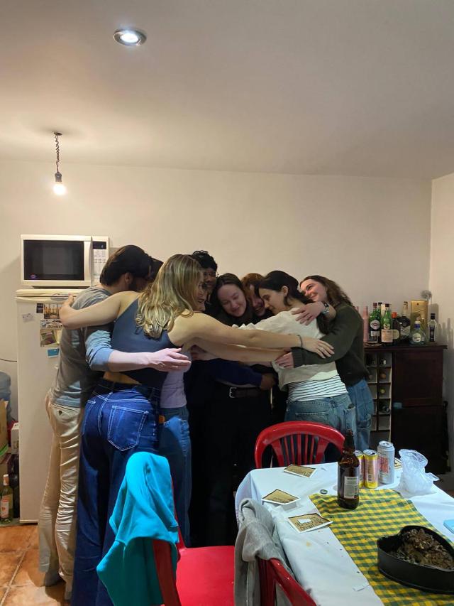 Rafid in the middle of a giant group hug with his friends from study abroad in Ushuaia, Argentina.