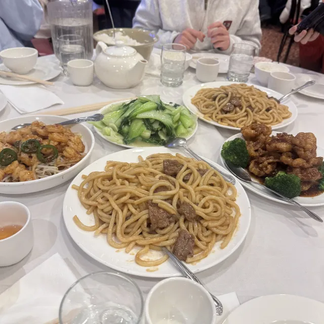 A picture of food, including noodles and chicken, ordered at Jade Garden.