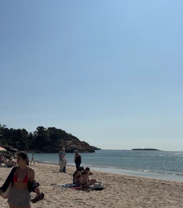 Beach with girl in corner of photo