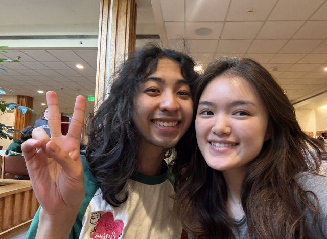 Mollie and Kai posing for a selfie for the interview.