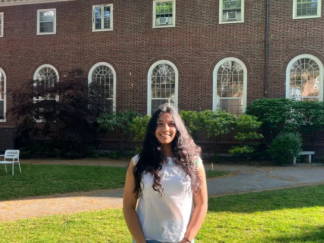 Oneli Perera outside on the Harvard campus.