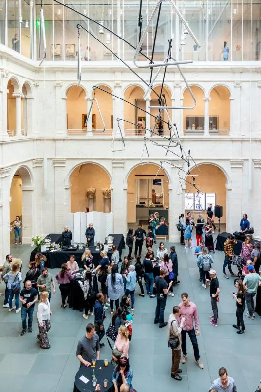 a photo of people inside the Harvard Art Museums