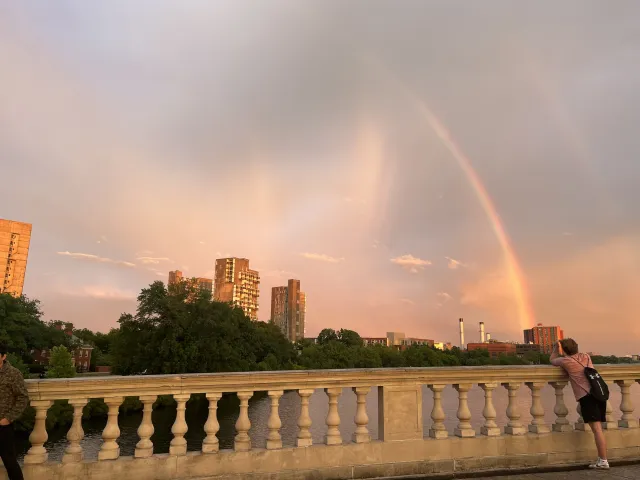 A view of a rainbow sunset from the pedestrian bridge