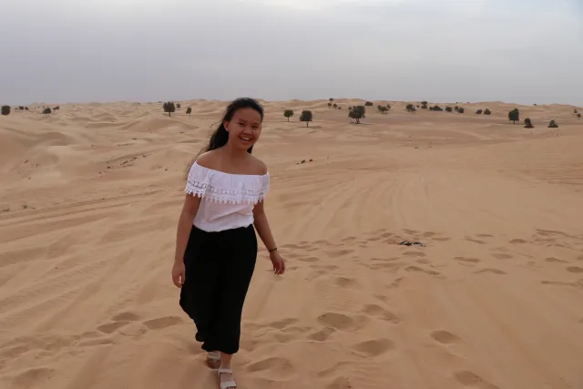 Student walking in dessert
