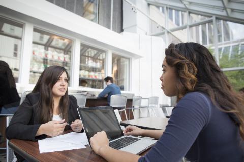 student and advisor talking to each other