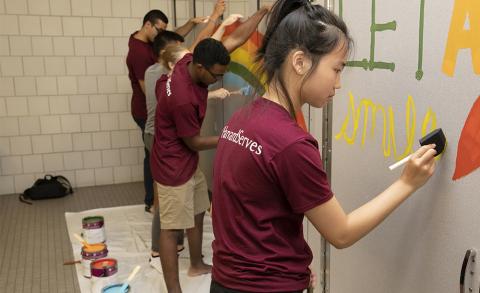 students painting