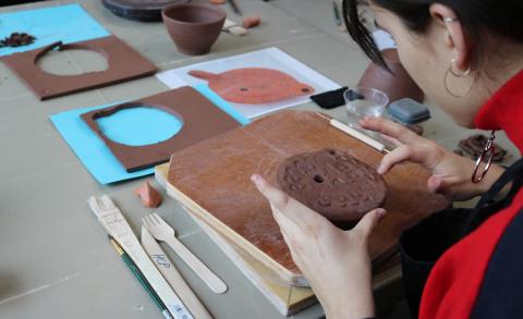 woman working on a ceramics project