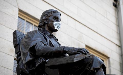 John Harvard Statue wearing a Mask