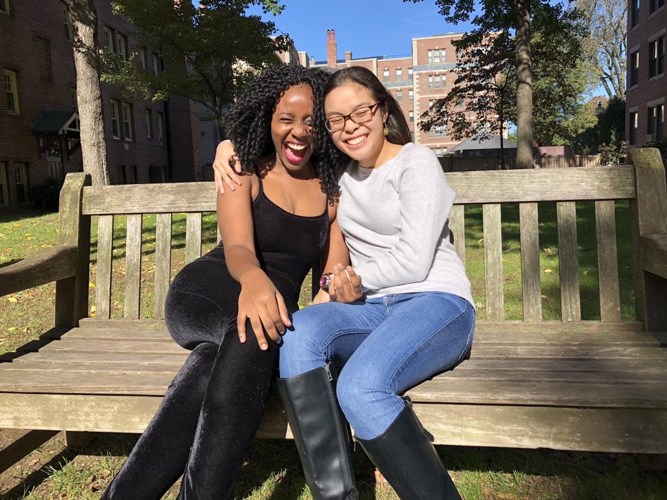 a picture of me and my roommate on the courtyard behind our first year housing