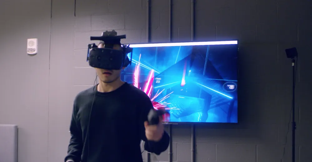 Student creating virtual reality game