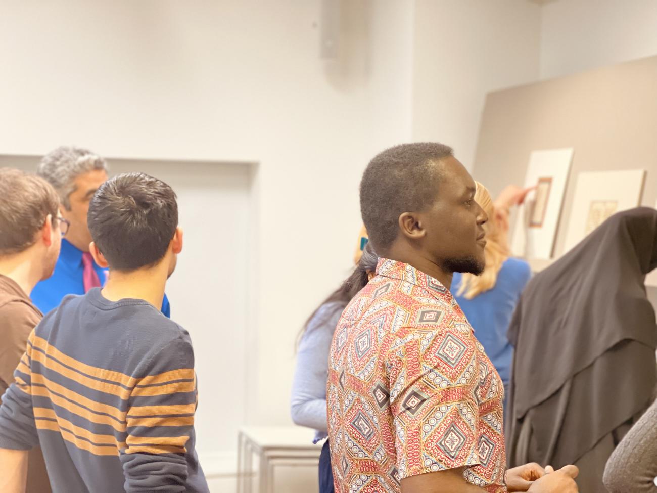 Author and other students viewing Arabic manuscripts