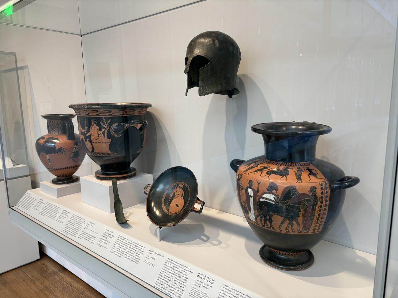 A collection of ancient Greek artifacts displayed at the Harvard Art Museum