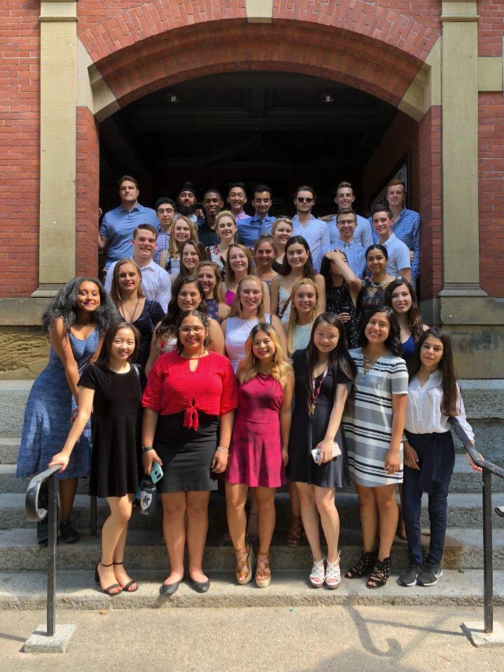 group of students on step of first-year dormitory