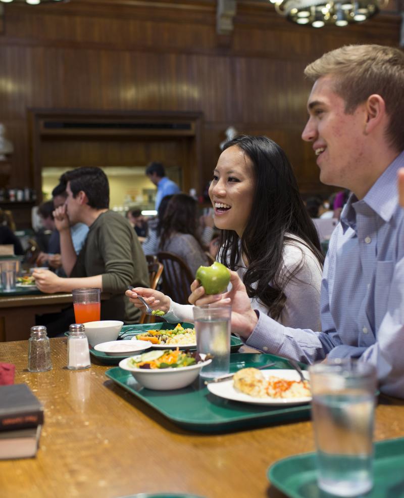 Students eating in dining hall 