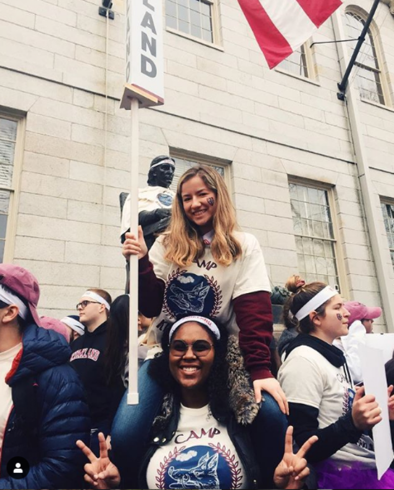 My friend Lourdes sitting on my shoulders at the housing day rally 2019
