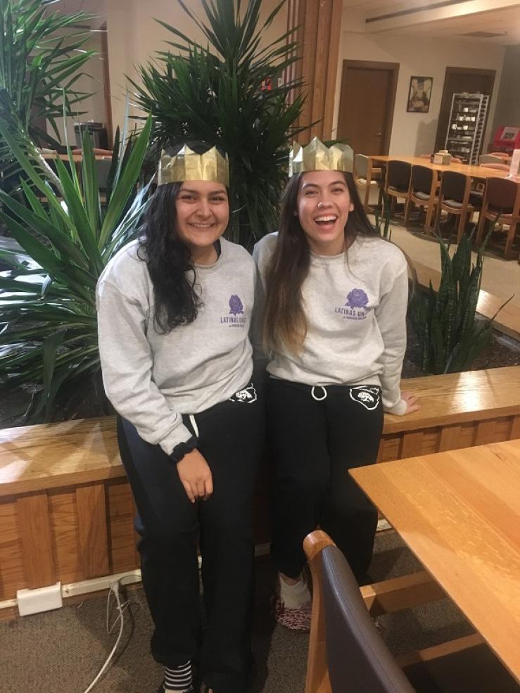 Maria posing with a friend in Currier House.
