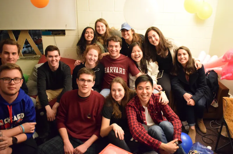 Group of friends posing for photo on couch