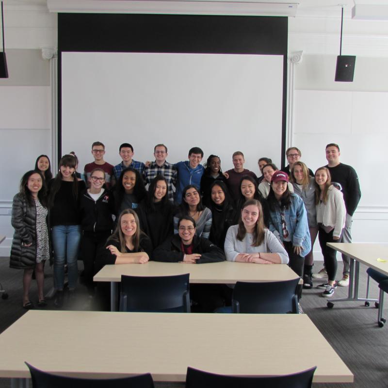 Classroom of undergraduates posing together