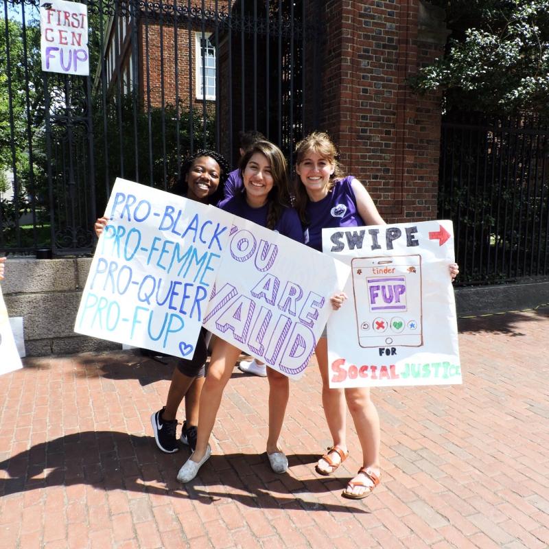 Maribel and two fellow FUP leaders welcome first year students.