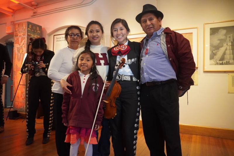 Picture of Amy and her family at her first Mariachi performance