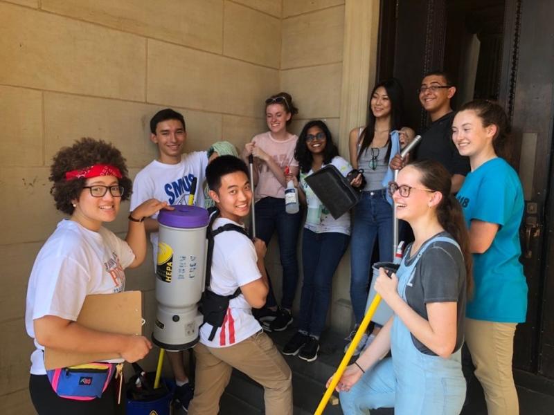 Our group taking a photo with our supplies on the last day of FCU.