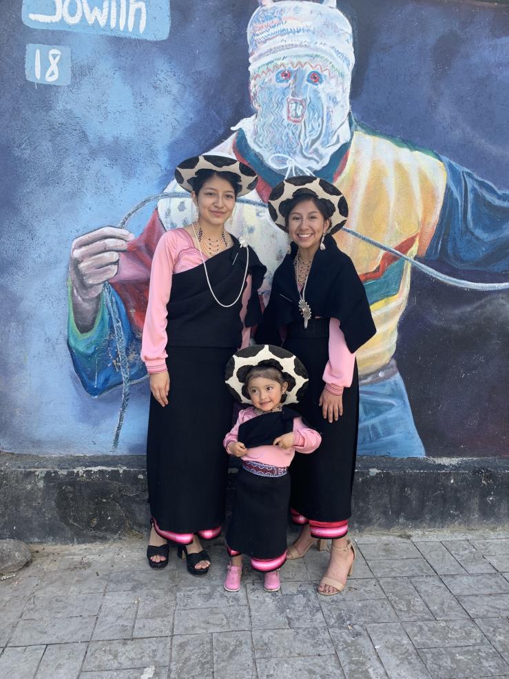 Amy and her family in traditional clothing