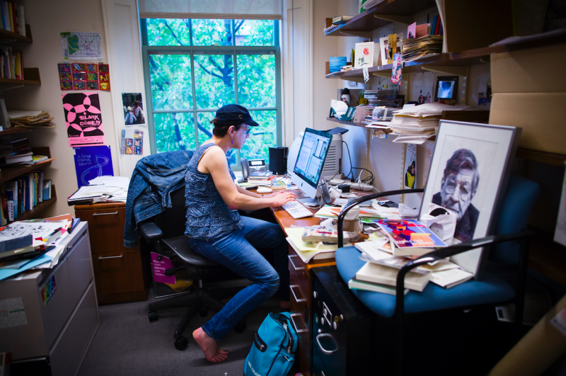 Professor Stephanie Burt works in her office, located in the Barker Center.