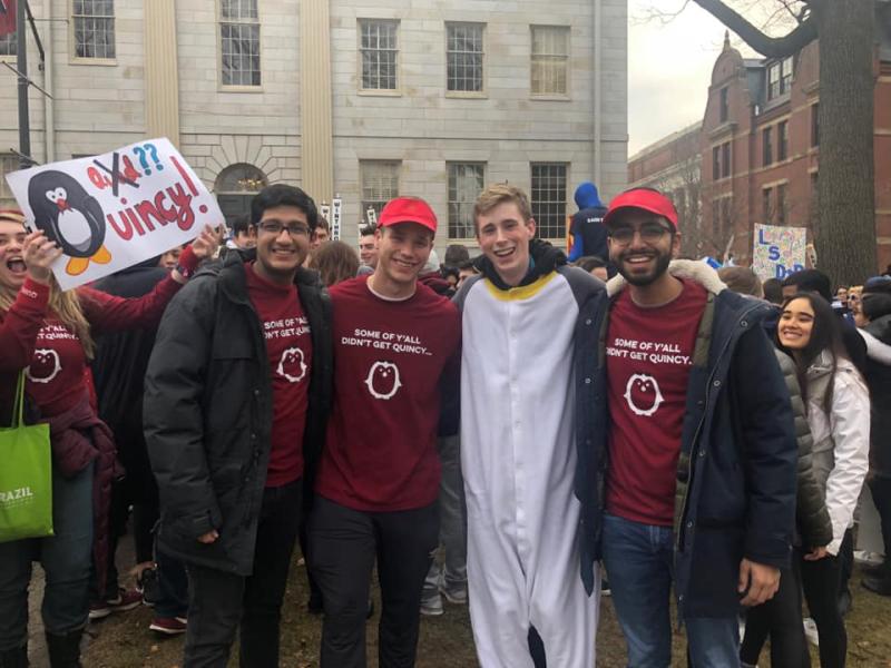 A group of students wearing Quincy House attire