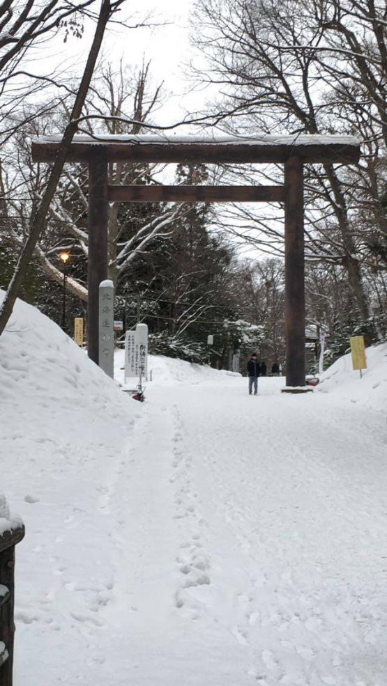 Wooden shrine gate in the snow