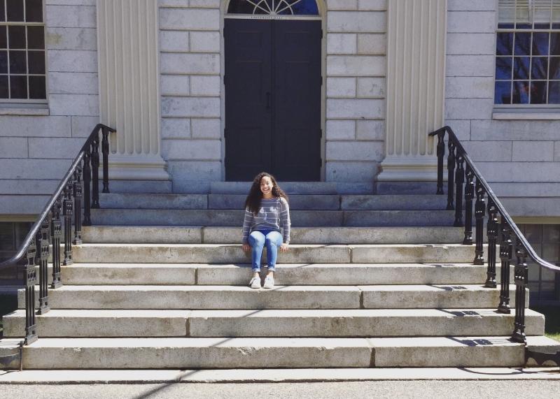 Girl sitting on steps