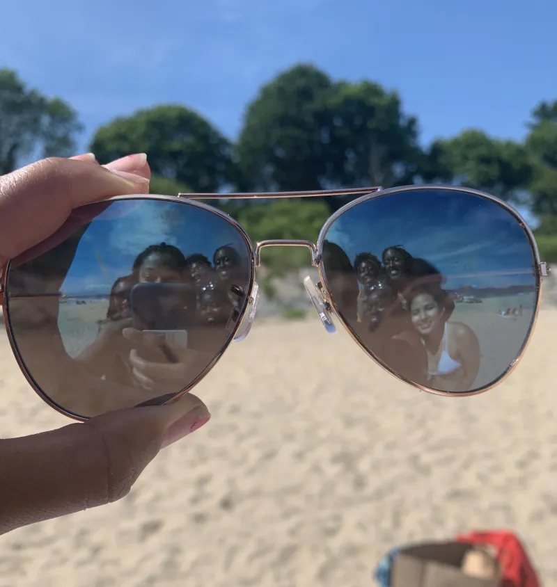 We took this cool picture at Singing Beach using my friend's sunglasses