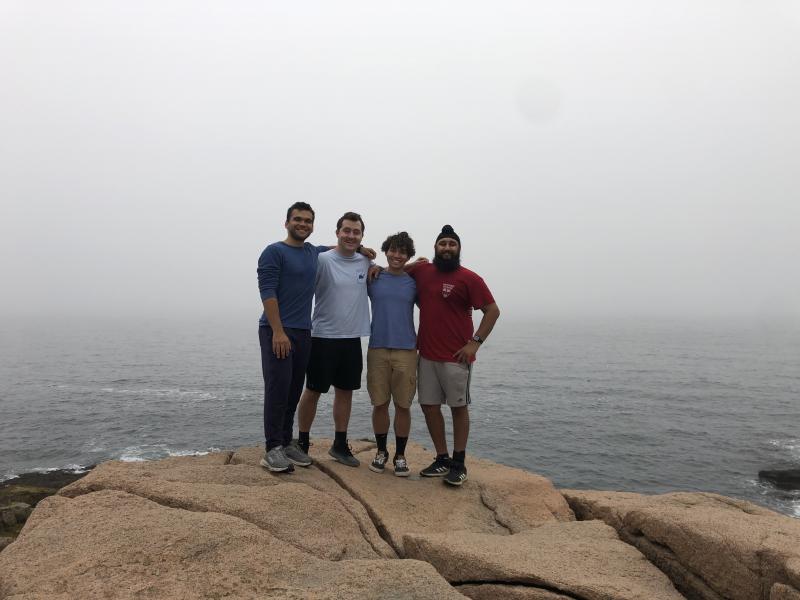 Harpreet with some friends and Acadia National Park
