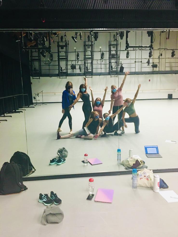 The Board gets together for a mirror selfie in the studio after auditions