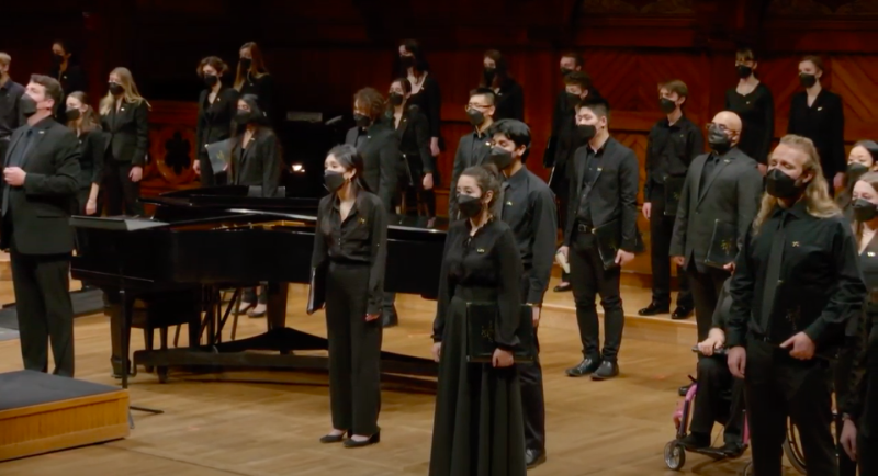 A picture of the Harvard-Radcliffe Collegium Musicum singing at Reunion: A Fall Concert.