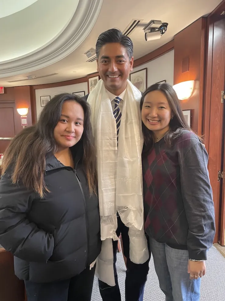Three people, with Mayor Elect of Cincinnati Aftab Pureval